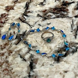 Jewelry set:Silver and Australian opals with zirconia crystals. Sterling silver